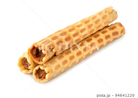 Wafer rolls with condensed milk isolated on white background 94641220