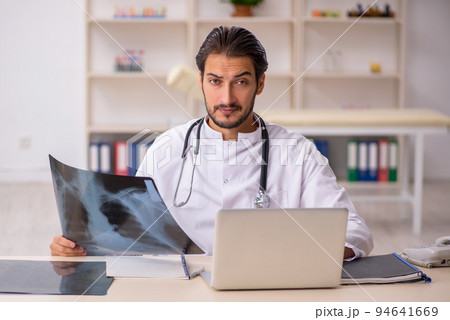 Young male doctor radiologist working in the clinic 94641669