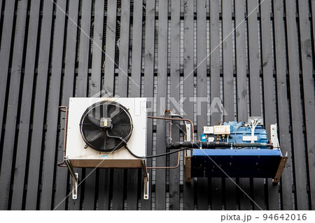 Air conditioning, ventilation and heating equipment. Black board building facade Air conditioning, ventilation and heating equipment. Black board building facade 94642016