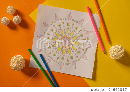 Mandalas antistress page to combat stress. Relaxing hobby mental wellbeing and art therapy. Meditative process of coloring pages. Self expression by art  94642017