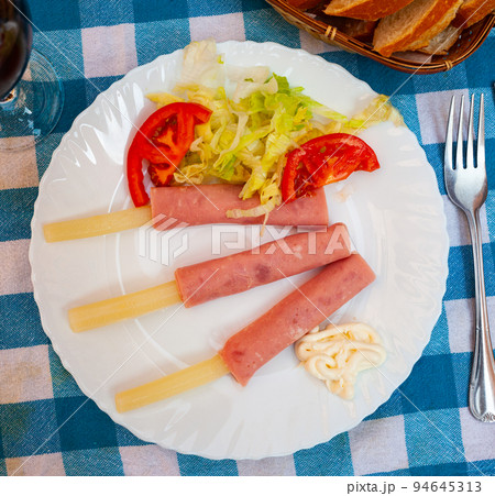 Deliciously asparagus rolls with ham and salad from vegetables 94645313