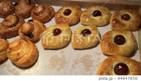 freshly baked danish pastry with apricot jam fruity jelly super delicious warm fresh buttery baked pastries with apricot and peach 94647650