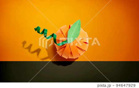 Paper craft autumn pumpkin overhead view 94647929