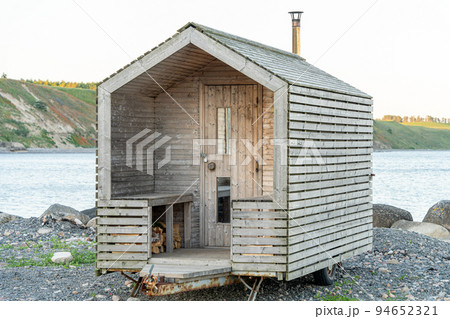 Outdoor wooden transportable sauna on the trailer with wheels Outdoor wooden transportable sauna on the trailer with wheels 94652321