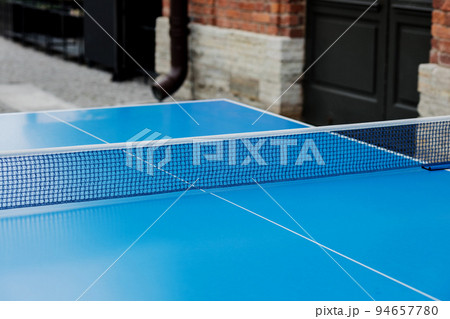 blue table tennis or ping pong. 94657780