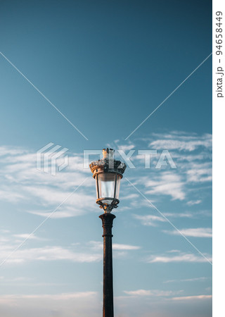 Victorian streetlight against sky 94658449