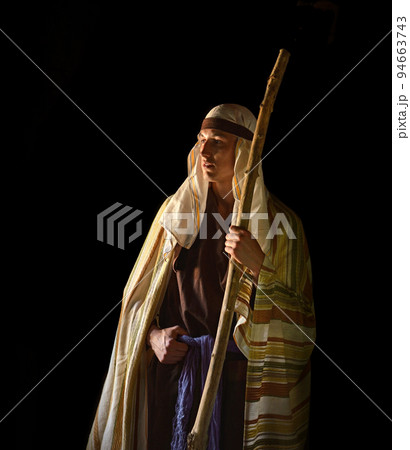Ancient man with wooden wand Ancient man with wooden wand 94663743