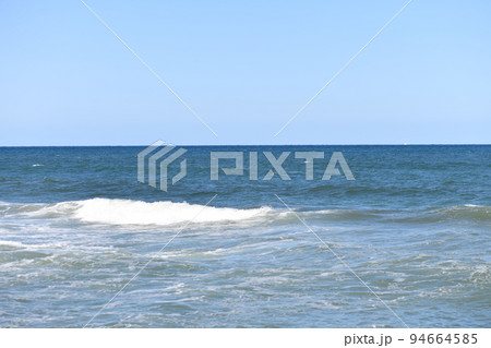 sea coast wave scenery nature blue sky sandy beach 94664585