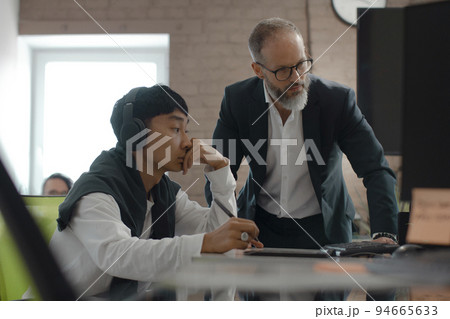 CEO of company studio developers of games discusses with the artist 3D model CEO of company studio developers of games discusses with the artist 3D model 94665633