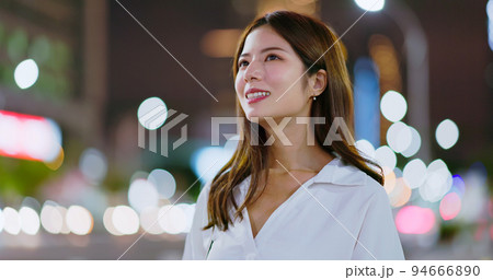 asian woman smile on street 94666890
