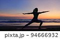 woman practice yoga on beach 94666932