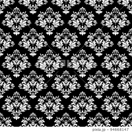 Wallpaper in the style of Baroque. Seamless vector background. White and black floral ornament. Graphic pattern for fabric, wallpaper, packaging. Ornate Damask flower ornament 94668147