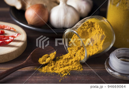 Heap of curry powder 94669064