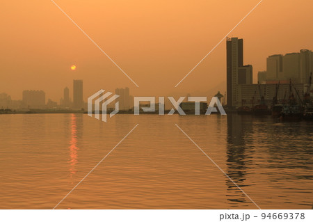 twilight during sunset. Photo taken from Kwun Tong Promenade, Hong Kong. 27 May 2011 twilight during sunset. Photo taken from Kwun Tong Promenade, Hong Kong. 27 May 2011 94669378