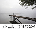 Jetty in the misty river Meuse 94670206