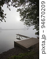 Jetty in the misty river Meuse 94670209