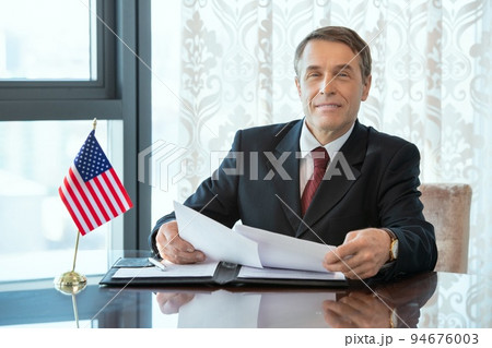 Photo realistic digital collage of successful American delegate or businessman 94676003