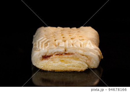 Bun with red strawberry jam baking in electric oven: close up Bun with red strawberry jam baking in electric oven: close up 94678166