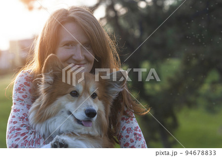beautiful corgi dog and girl 94678833