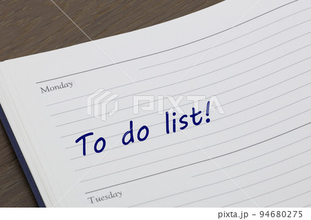 To do list diary reminder open on desk 94680275