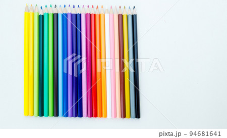 Colored pencil crayons in a row 94681641