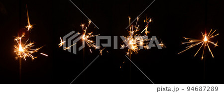 Set of sparkler with sparks with lens glare on black background for overlay blending mode for holiday design projects Set of sparkler with sparks with lens glare on black background for overlay blending mode for holiday design projects 94687289
