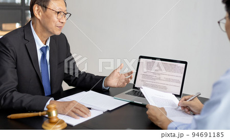 Attorney or judge provides legal advice to the client in the courtroom, Ethics in the courts include justice and impartiality, Legal consultant, Scales of justice, Law hammer, Litigation and justice. 94691185