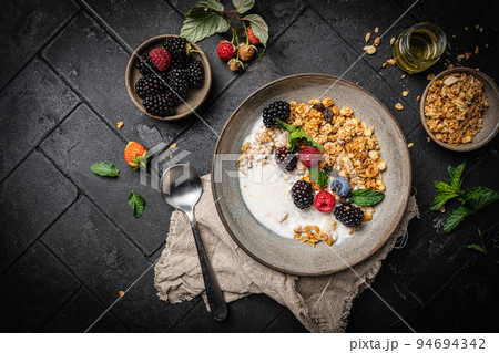 Bowl of homemade granola Bowl of homemade granola 94694342