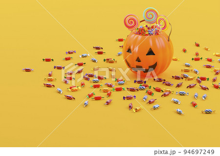 キャンディがいっぱいに詰まったジャックオーランタンのバケツ / ポップで楽しいハロウィンイメージ キャンディがいっぱいに詰まったジャックオーランタンのバケツ / ポップで楽しいハロウィンイメージ 94697249