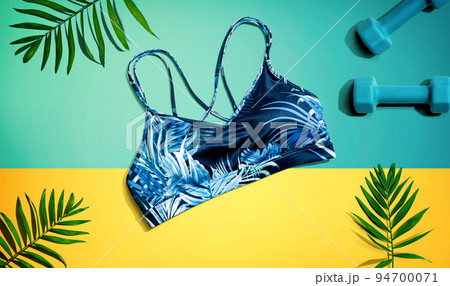 Fitness theme with dumbbells and sports bra 94700071