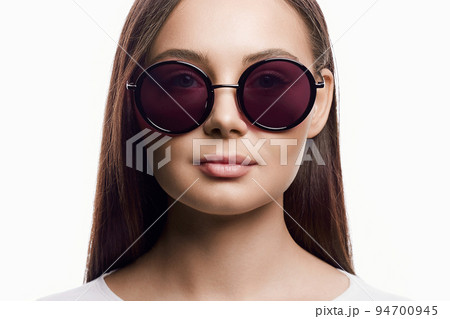 Beautiful woman in sunglasses. beauty girl in pink Glasses 94700945