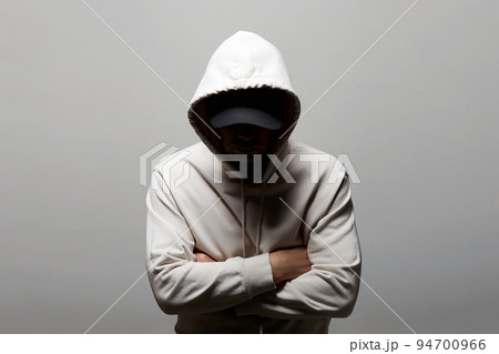 Man in Hood. Boy in white hooded sweatshirt Man in Hood. Boy in white hooded sweatshirt 94700966