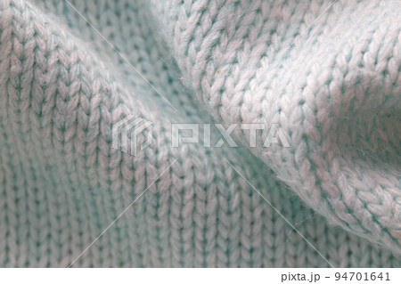 Warm gray sweater material, background, macro. Comfort Warm gray sweater material, background, macro. Comfort 94701641