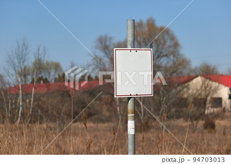 Empty sign on a land 94703013