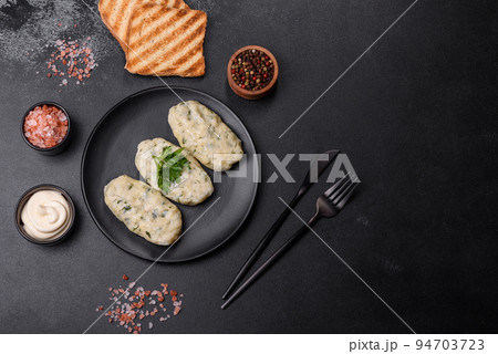 Traditional Lithuanian dish zeppelin, boiled potato dumplings stuffed with minced meat 94703723