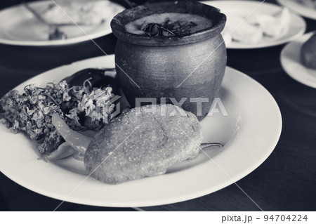 Lunch at Georgian cafe. Black and white retro toned 94704224