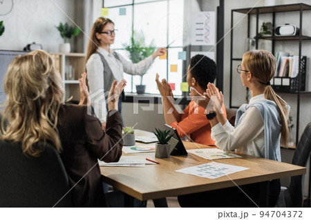 Business woman colleagues gathering at office room for brainstorming. 94704372