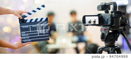 Man hands holding movie clapper . Film director concept. Man hands holding movie clapper . Film director concept. 94704999