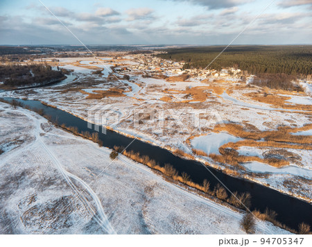 Winter aerial rural view on river valley, Ukraine Winter aerial rural view on river valley, Ukraine 94705347
