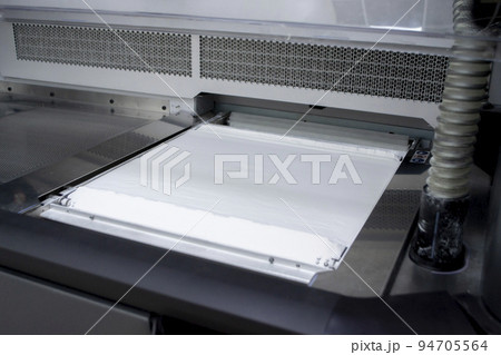 White polyamide powder for printing powder 3d printer close-up. Powder for high-speed printing of 3D printer on working surface inside printer. New modern printing technology. Multi Jet Fusion MJF White polyamide powder for printing powder 3d printer close-up. Powder for high-speed printing of 3D printer on working surface inside printer. New modern printing technology. Multi Jet Fusion MJF 94705564