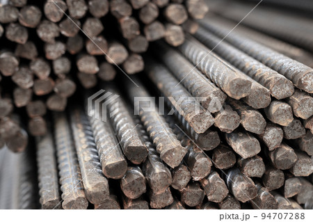 Steel rods bars can used for reinforce concrete. Reinforced iron for concrete construction. Steel rods bars can used for reinforce concrete. Reinforced iron for concrete construction. 94707288