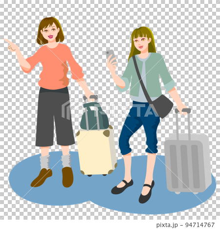 スーツケースを持って移動する旅行中の二人の若い女性 94714767