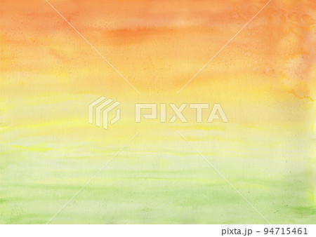 水彩のオレンジから黄緑へのグラデーション背景の写真素材 [94715461