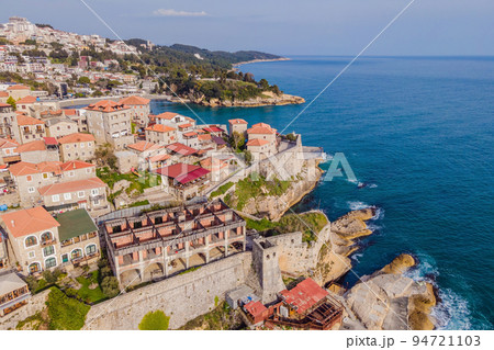 Amazing view on Ulcinj town in Montenegro. Clock Tower of Ulcinj Sahat Kulla. Lami Mosque. Ulcinj is a popular tourist destination in the summer on the southern Adriatic coast of Montenegro. Ulqin Amazing view on Ulcinj town in Montenegro. Clock Tower of Ulcinj Sahat Kulla. Lami Mosque. Ulcinj is a popular tourist destination in the summer on the southern Adriatic coast of Montenegro. Ulqin 94721103