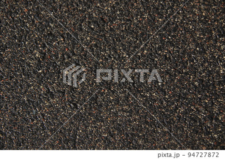 wet rough textured asphalt background 94727872