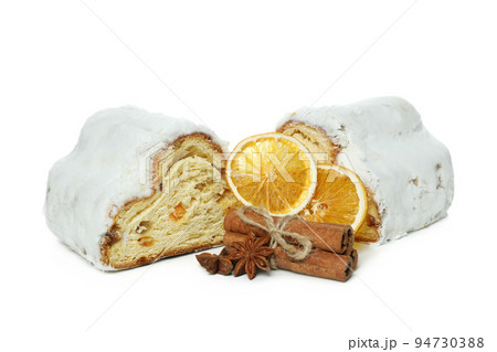 Stollen, tasty German dessert, isolated on white background Stollen, tasty German dessert, isolated on white background 94730388
