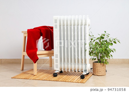 Concept of heating season, modern electric heater in room 94731058