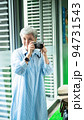 Portrait of happy senior adult elderly asia woman 60s taking pictures with photo camera for travel concept. 94731543