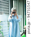 Portrait of happy senior adult elderly asia woman 60s taking pictures with photo camera for travel concept. 94731547