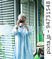 Portrait of happy senior adult elderly asia woman 60s taking pictures with photo camera for travel concept. 94731548